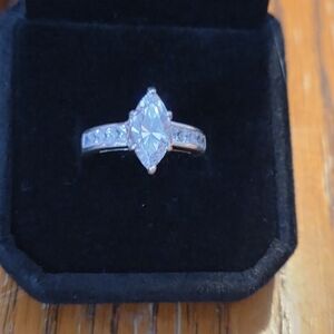 Marquise-Cut Silver Solitaire Ring with Side Stones - White